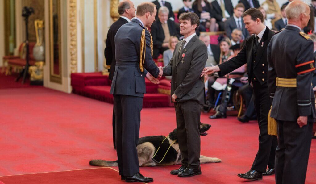 Robin Christopherson MBE meeting the Duke of Cambridge to receive his MBE